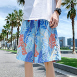 Men Quick Dry Tropical Leaf Print Beach Shorts Elastic Waist Drawstring Casual Board Shorts for Summer Vacation