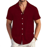 Men Vertical Striped Textured Short Sleeve T-Shirt Lapel Collar Chest Pocket Button Down Loose Summer Blouse
