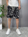 Breathable Daily Wear Textured Casual Drawstring Shorts Edgy Graffiti Print Men's Streetwear Casual Shorts