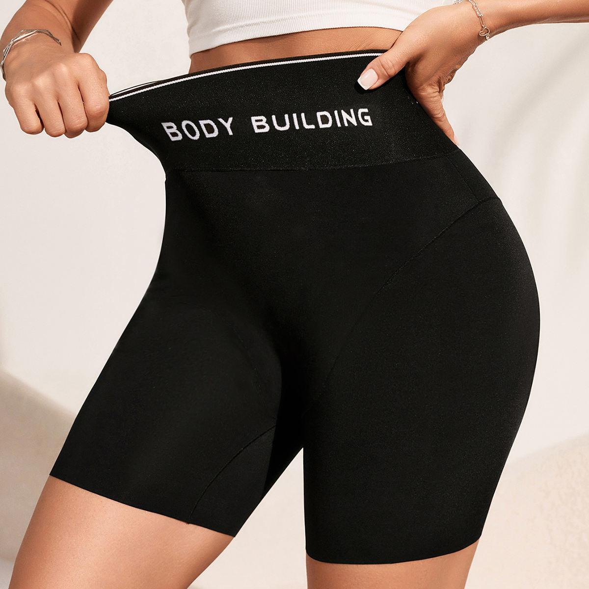 Black Mid-Thigh Shaper Shorts with Slogan Waist